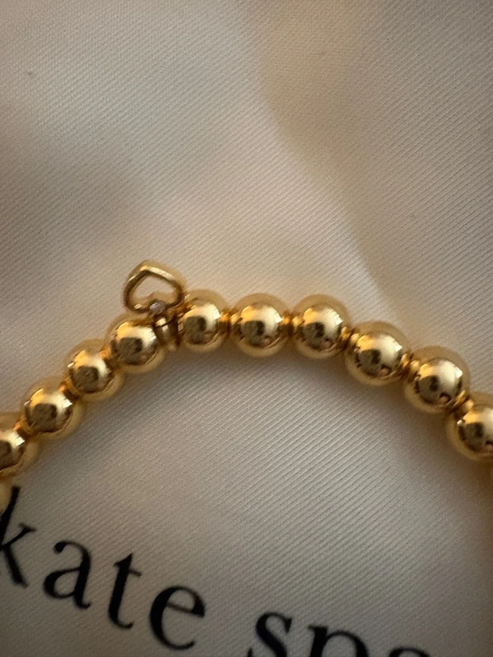 kate spade Gold Beaded Bracelet with Red Gem Charm - Picture 4 of 6